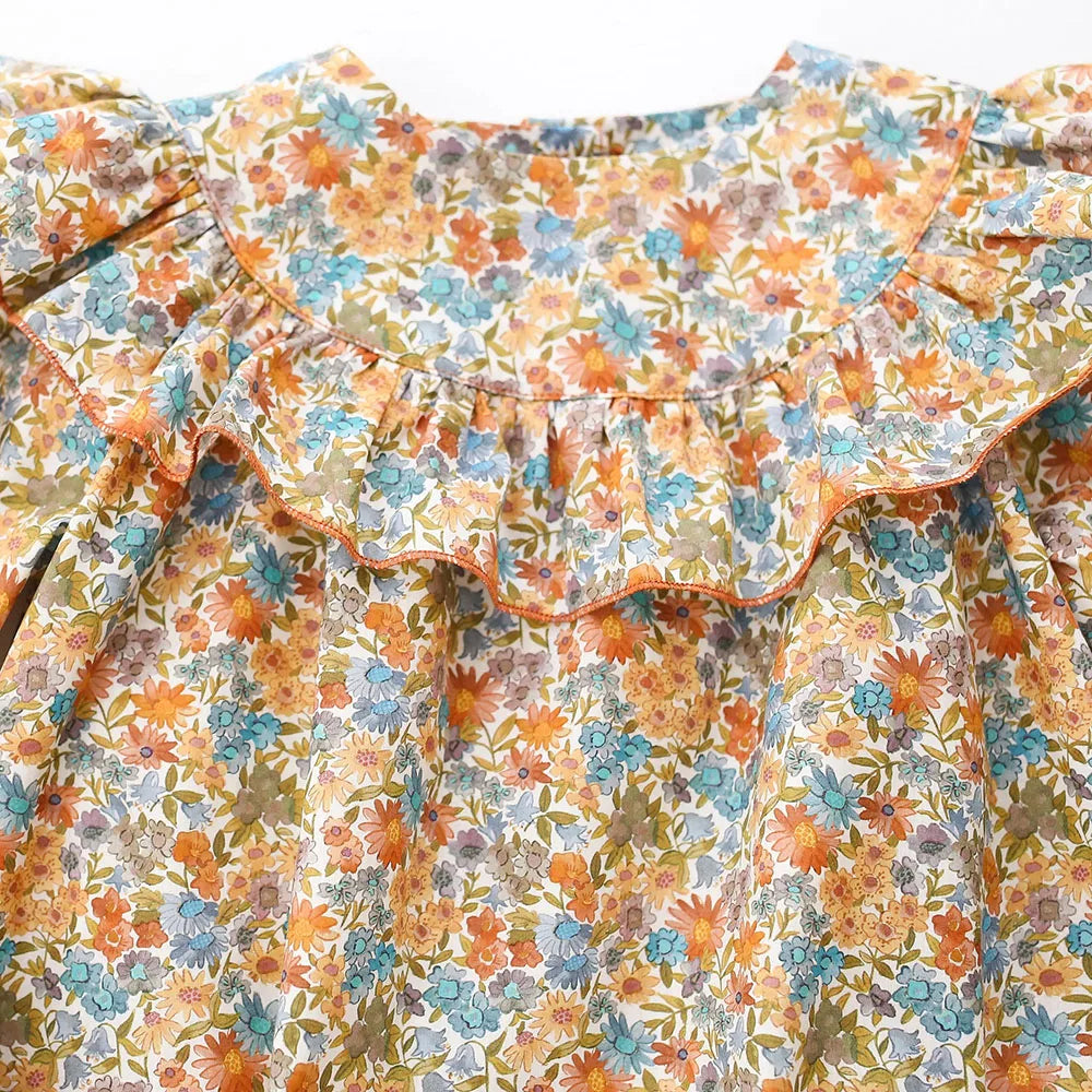 NEW Long Sleeve Flirty Floral Romper